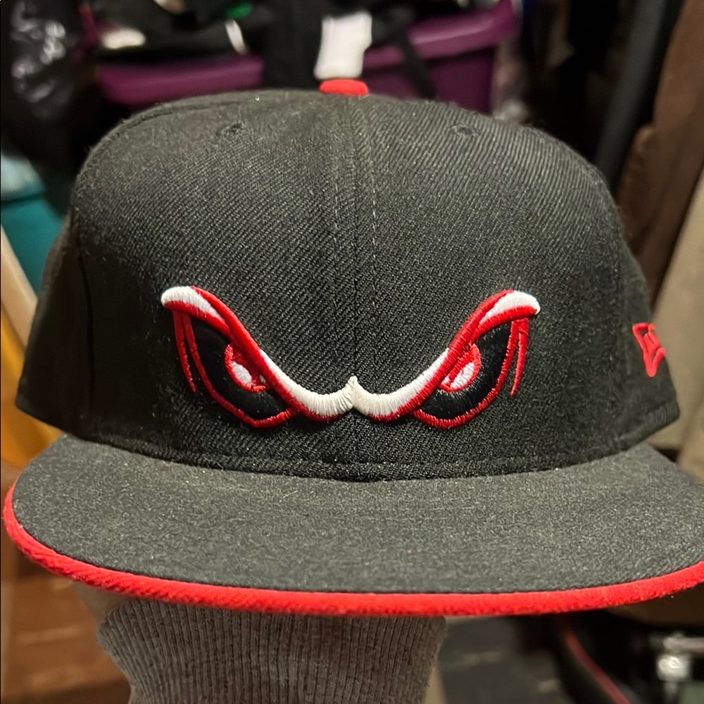 New Era Black Cap with Red Eye Design